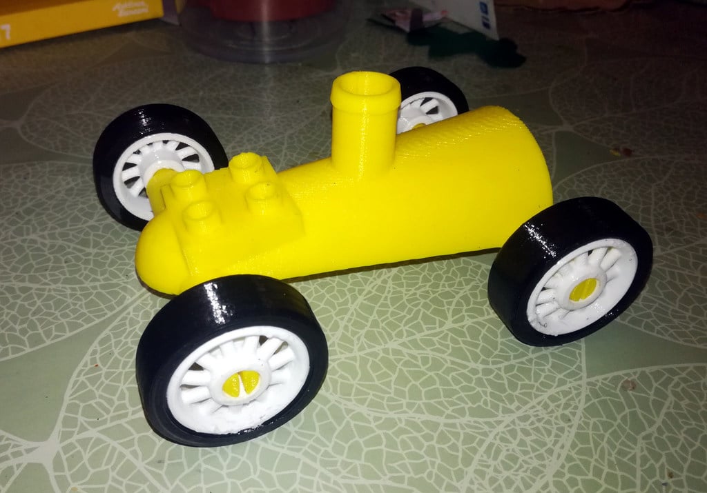 Wheels with tires for balloon powered car