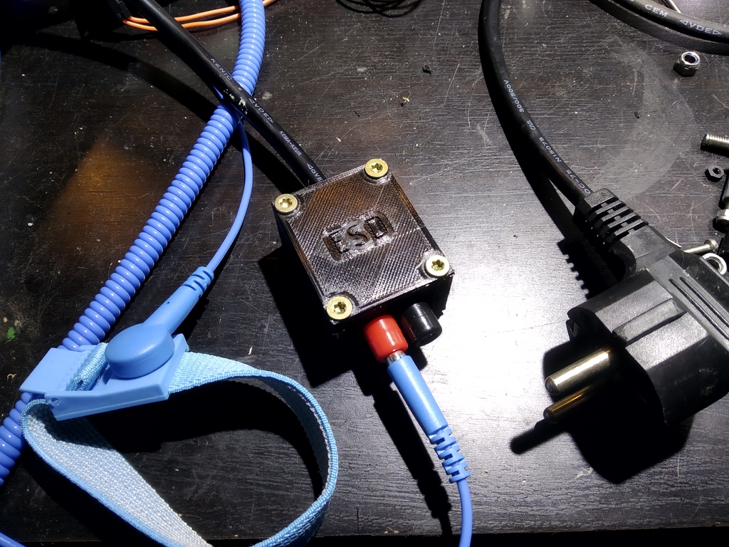 ESD adapter box for grounding via ground wire of AC power plug