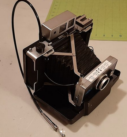 Polaroid cable release adapter
