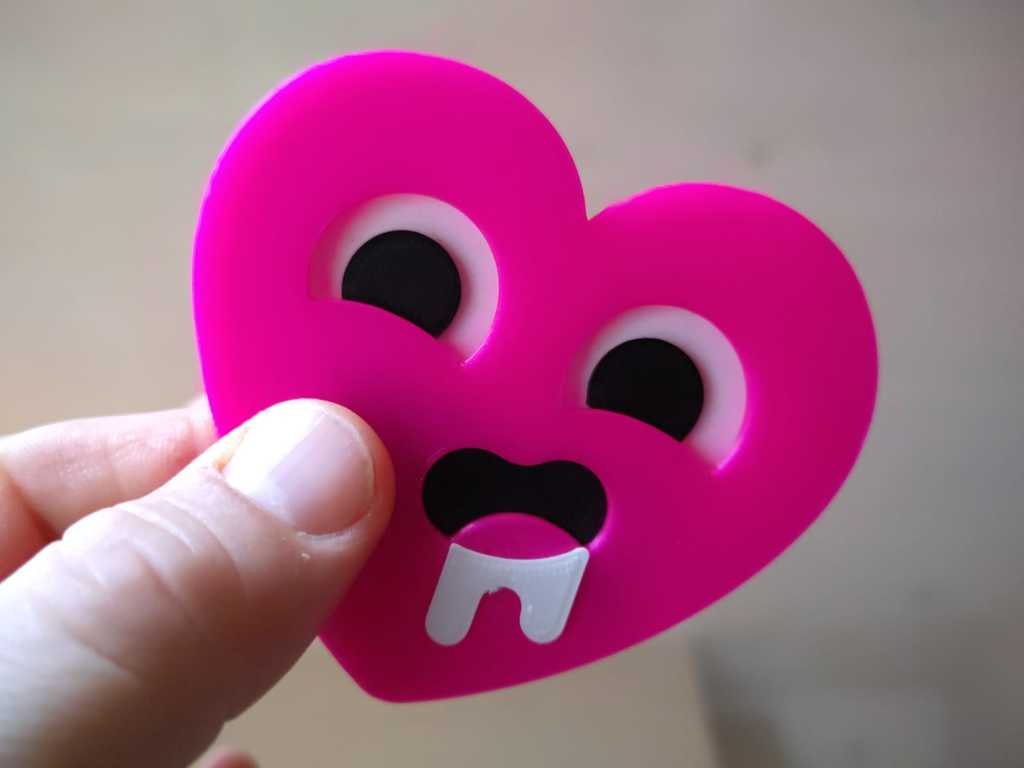 The "horny heart" emoji 3d badge