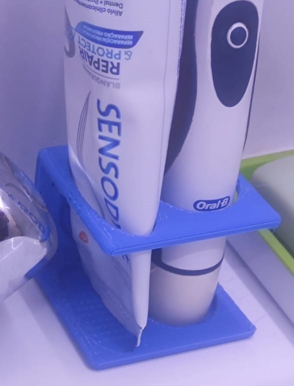 Base de baño DuoDent - Cepillo OralB + Pasta dentrifica