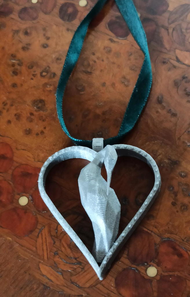 Low poly crane in heart necklace