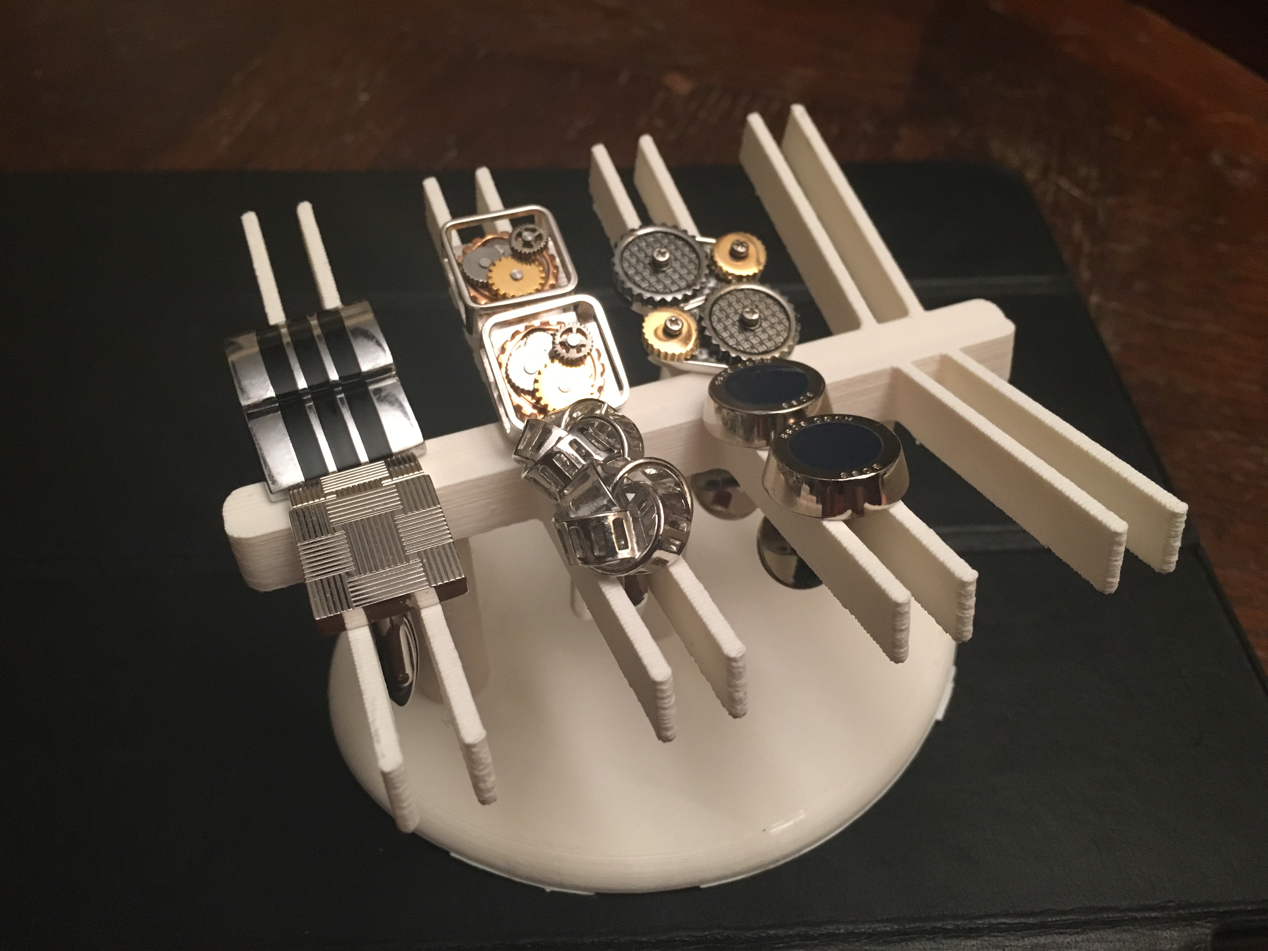 Cuff links holder