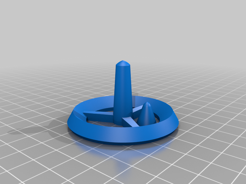 Space station spinning top with aligning pin