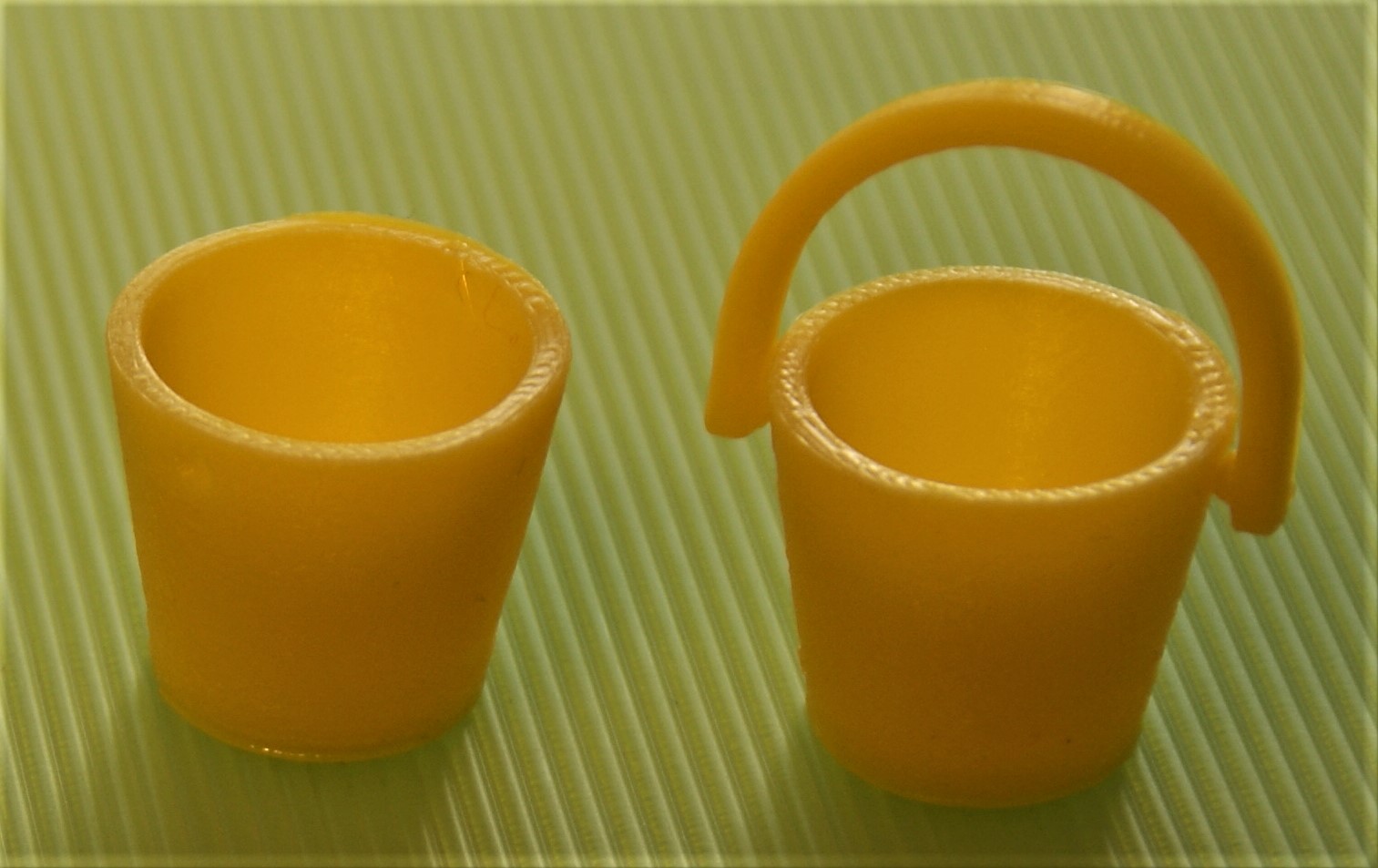 Toy bucket and drinking trough