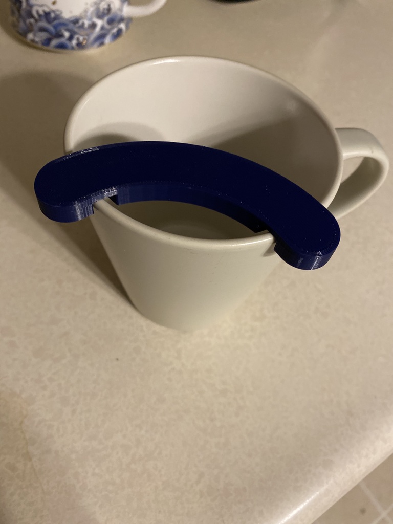 Mustache guard for a coffee cup with a diameter about 100mm