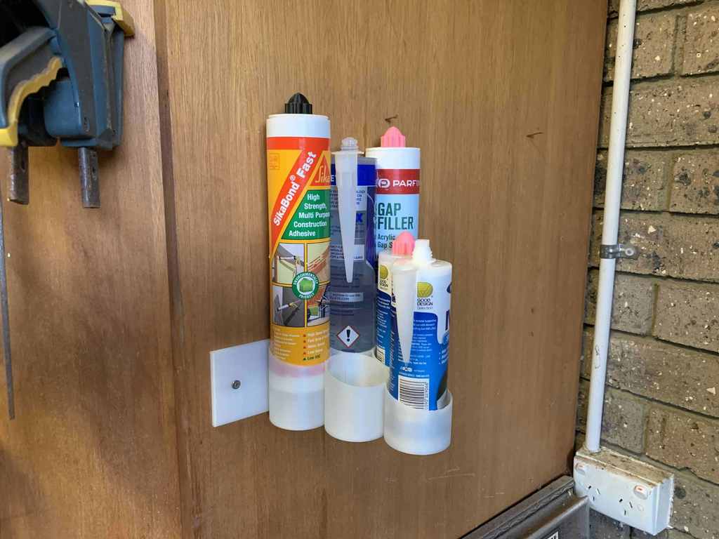 Caulk tube holder - wall mounted and free standing (plus test ring) 