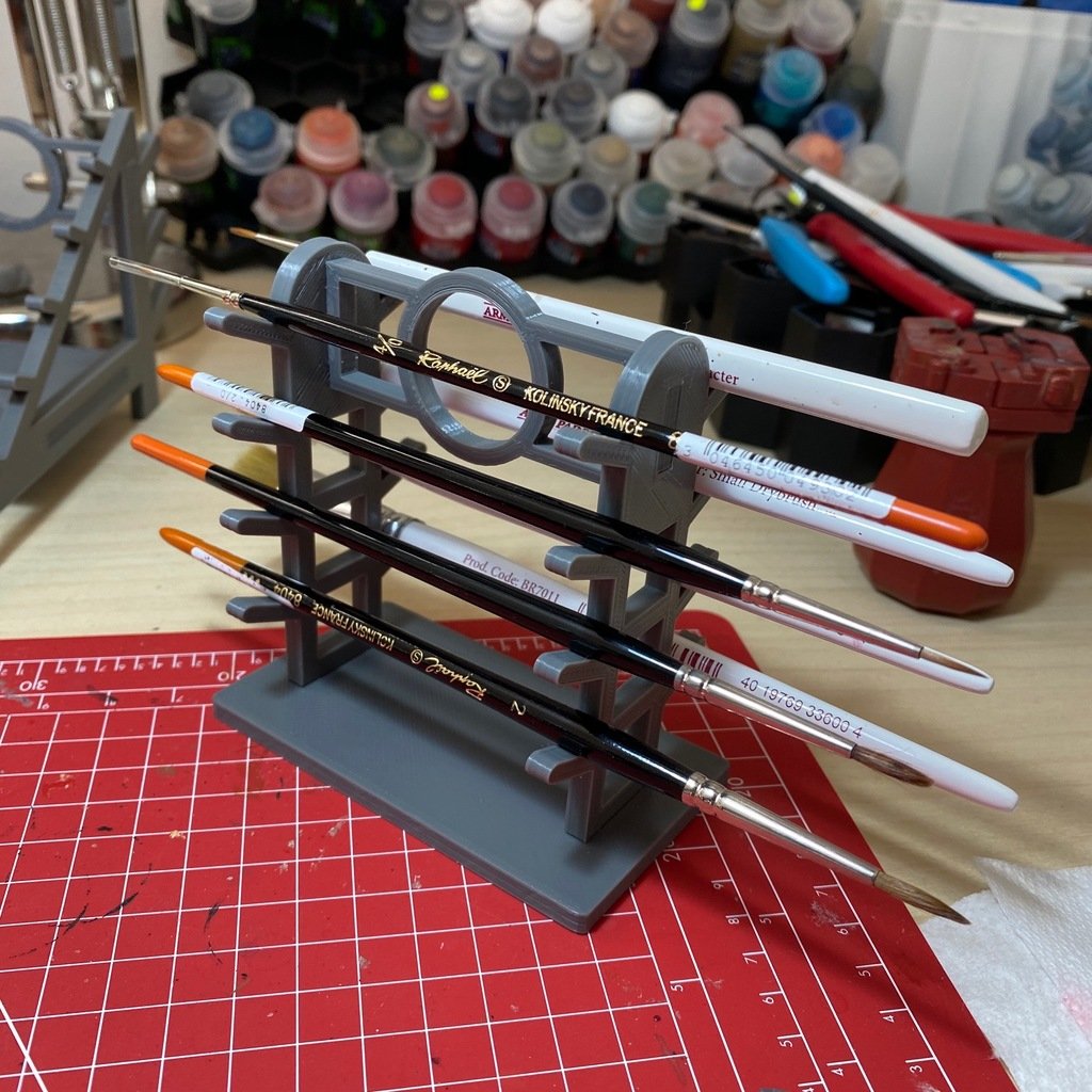Sword-style paintbrush rack