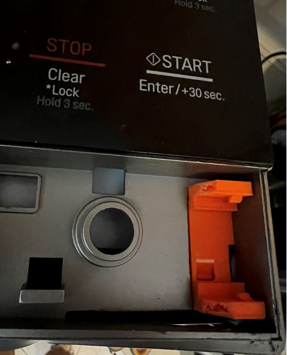 LG Microwave door release button bracket
