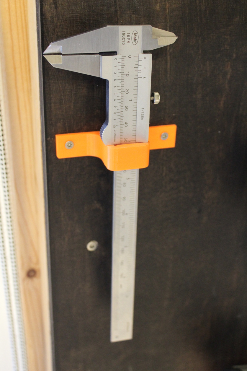 caliper wall mount