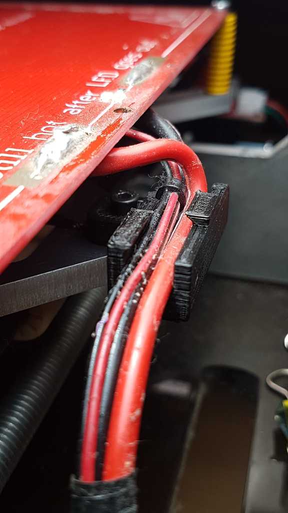 Heated bed cable support