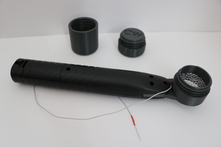 Static grass applicator with printable cover and container