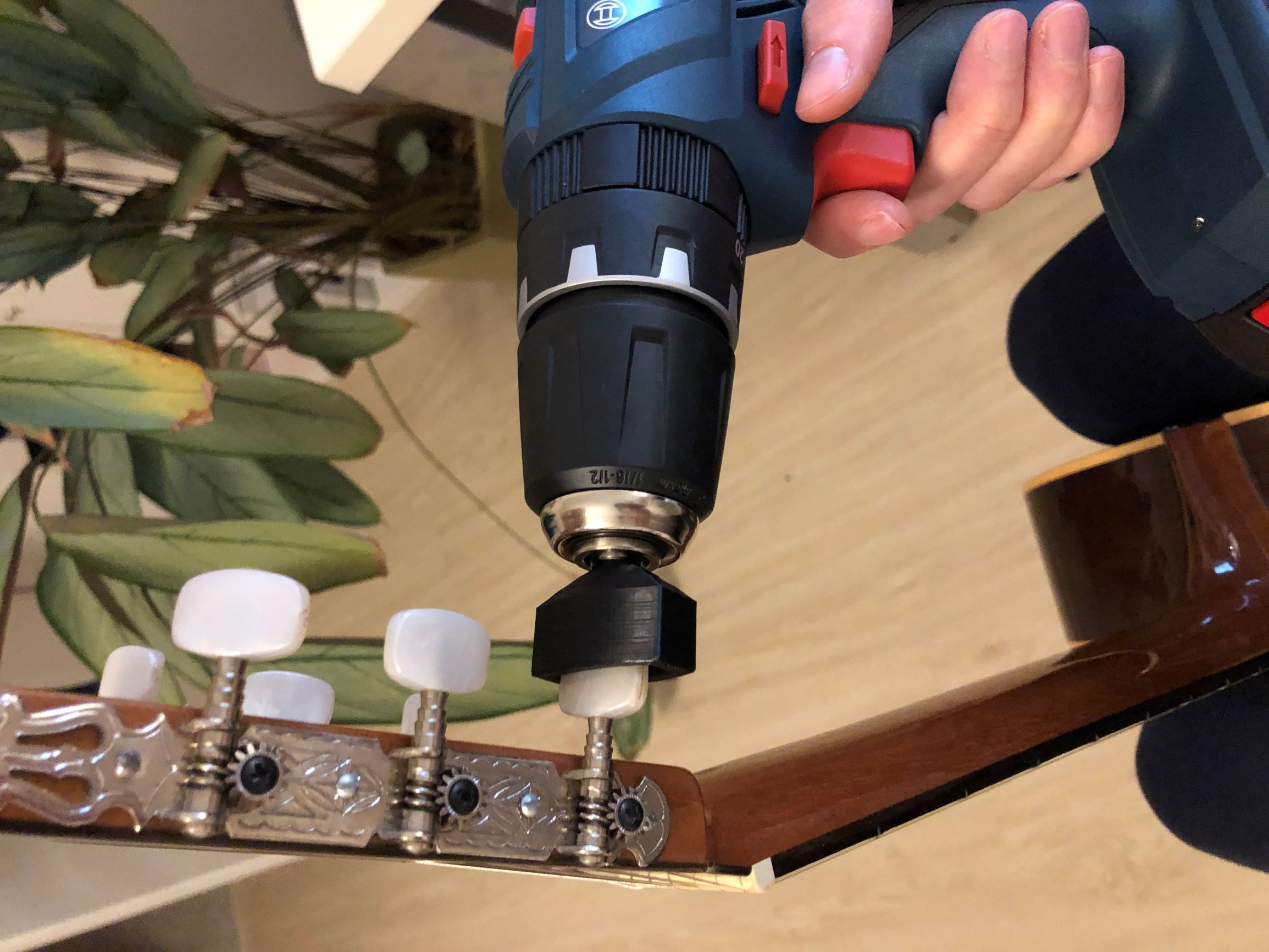 Guitar string winder for drill tools