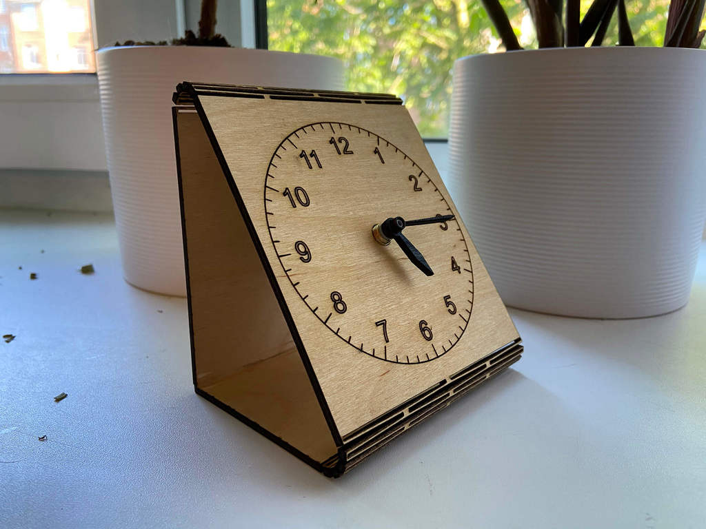 Table clock with living hinge using laser cutting