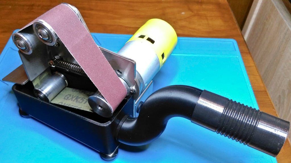 Dust extractor for the mini electric belt sander