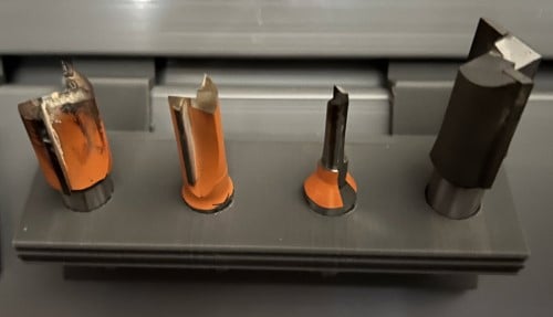 Slat-wall router bit holders