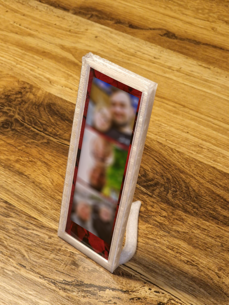 Picture frame for photo strip