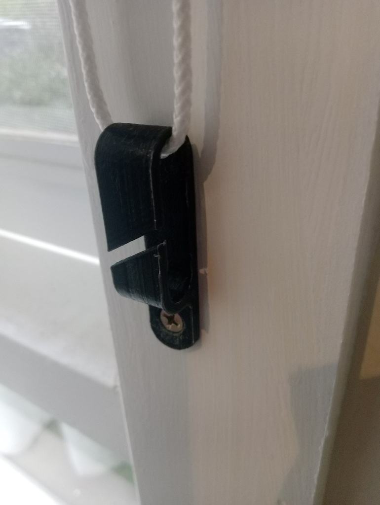 Curtain cord safety clip