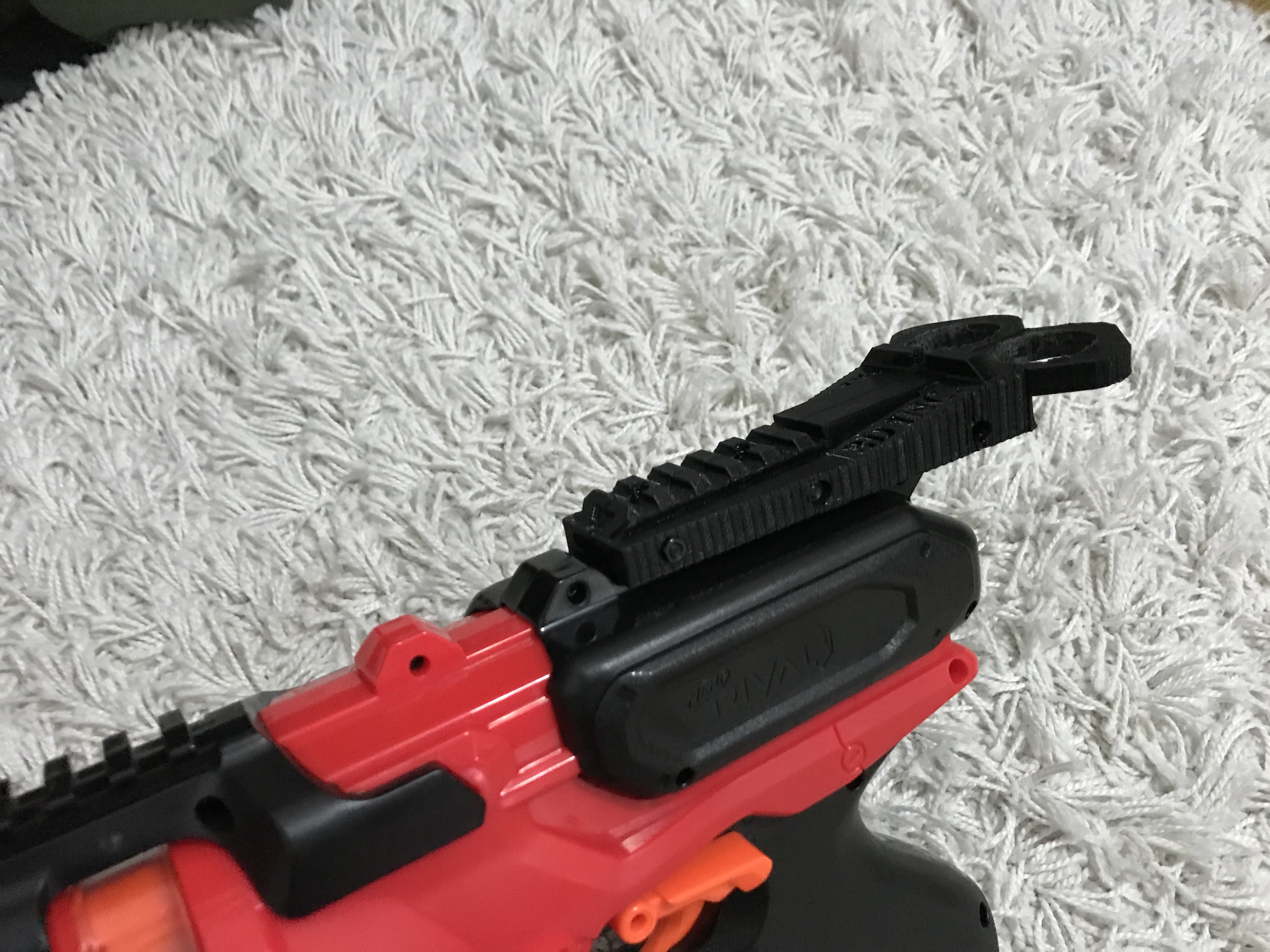 Roundhouse grap handle with picatinny rail