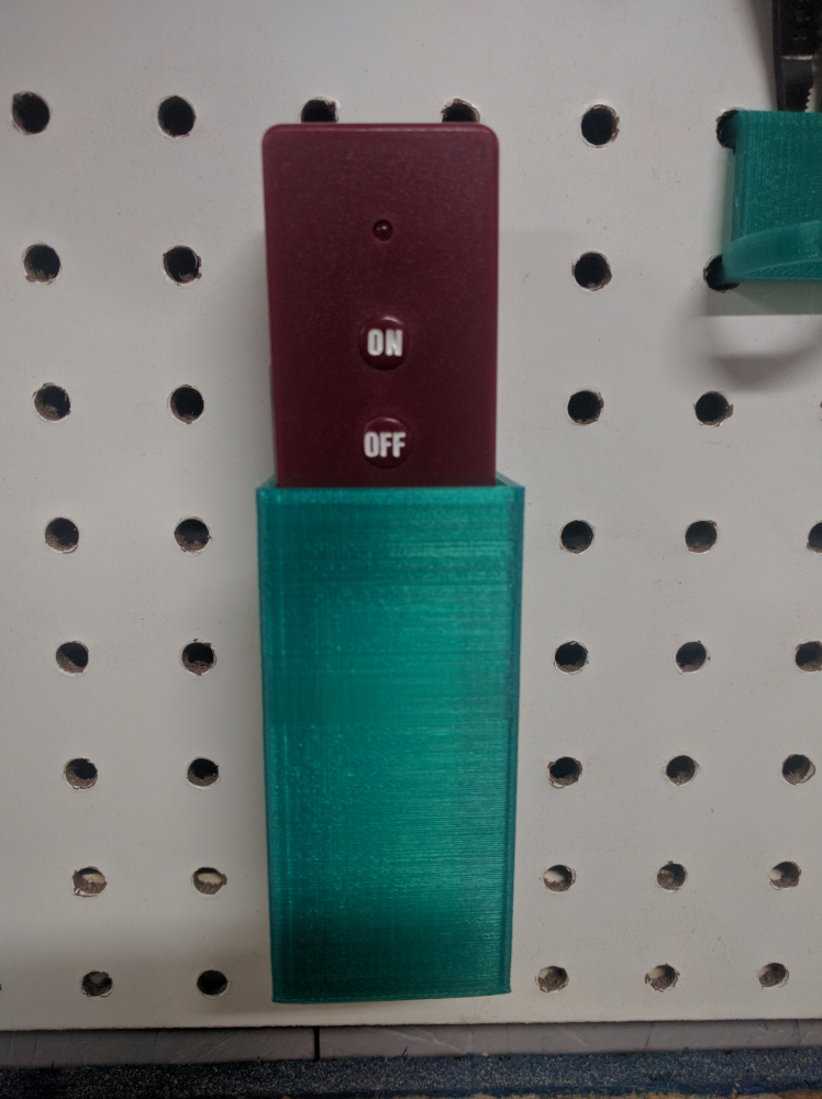 Dust Collector Remote Cradle for Pegboard