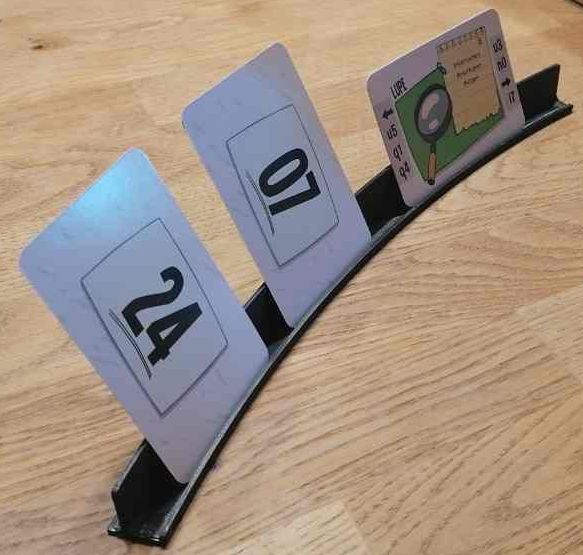 Curved card holder for board games