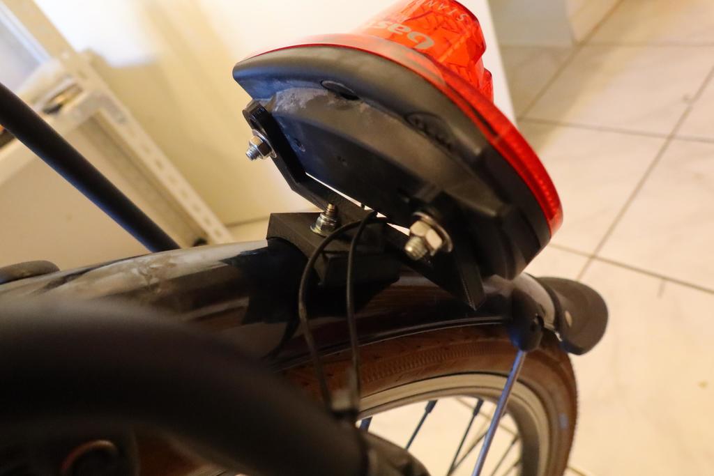 Bicycle tail light holder for fender