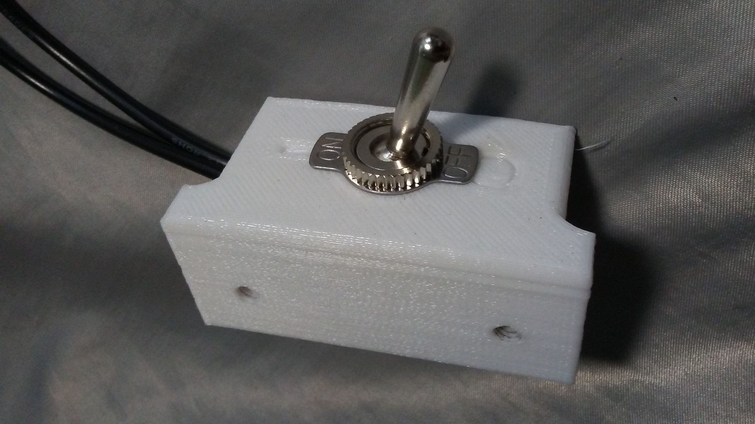 Toggle switch holder