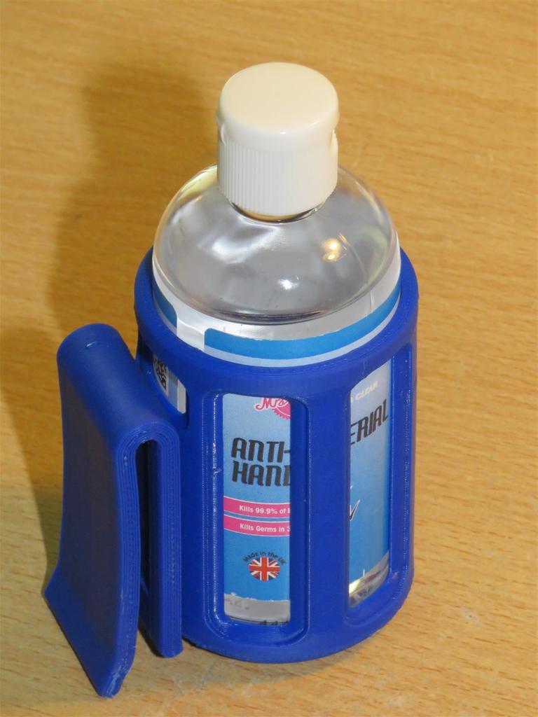 Belt clip holder for small gel bottle.
