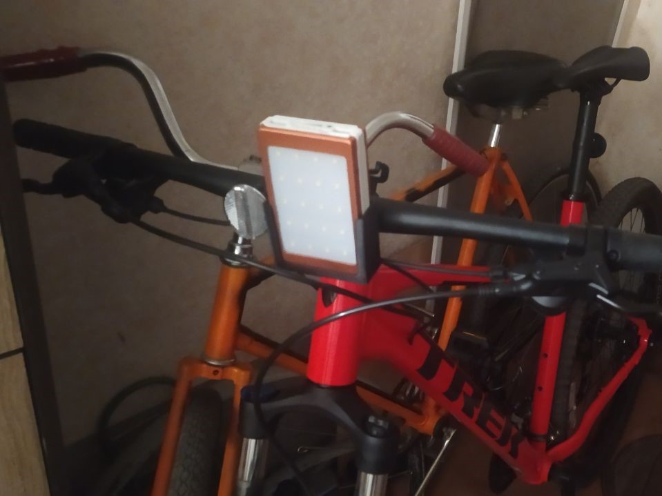 Bicycle powerbank lights holder