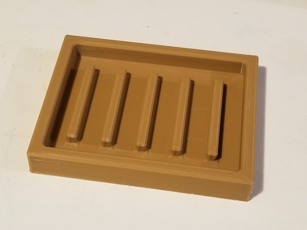 Soap dish with risers