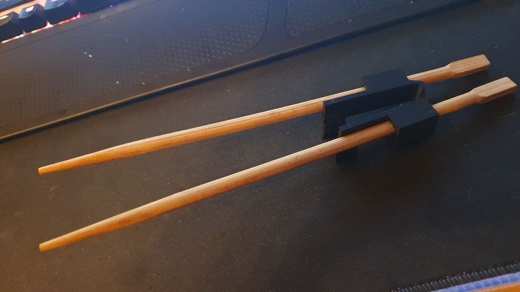 wearable chopstick trainer