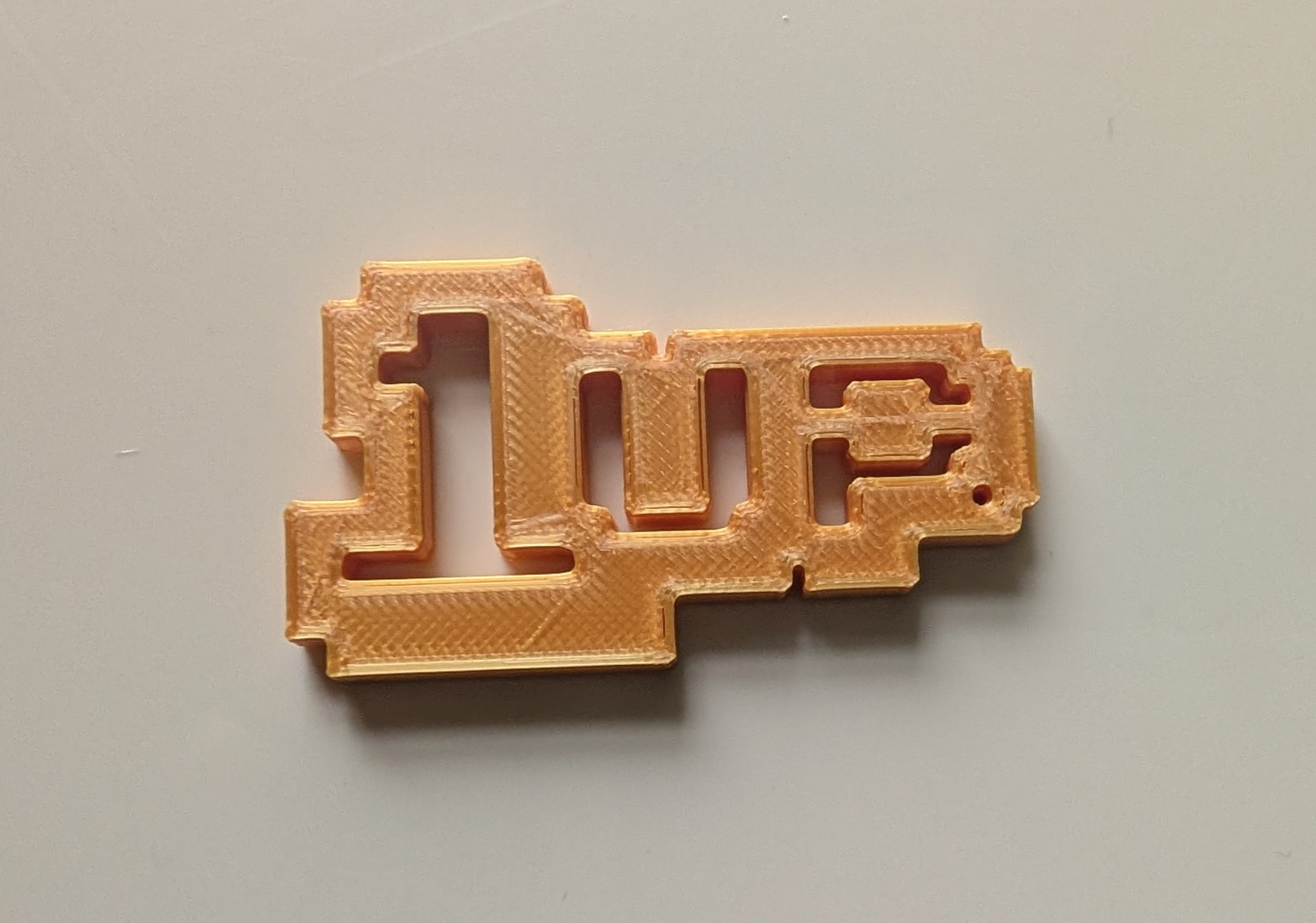 1 UP Keychain