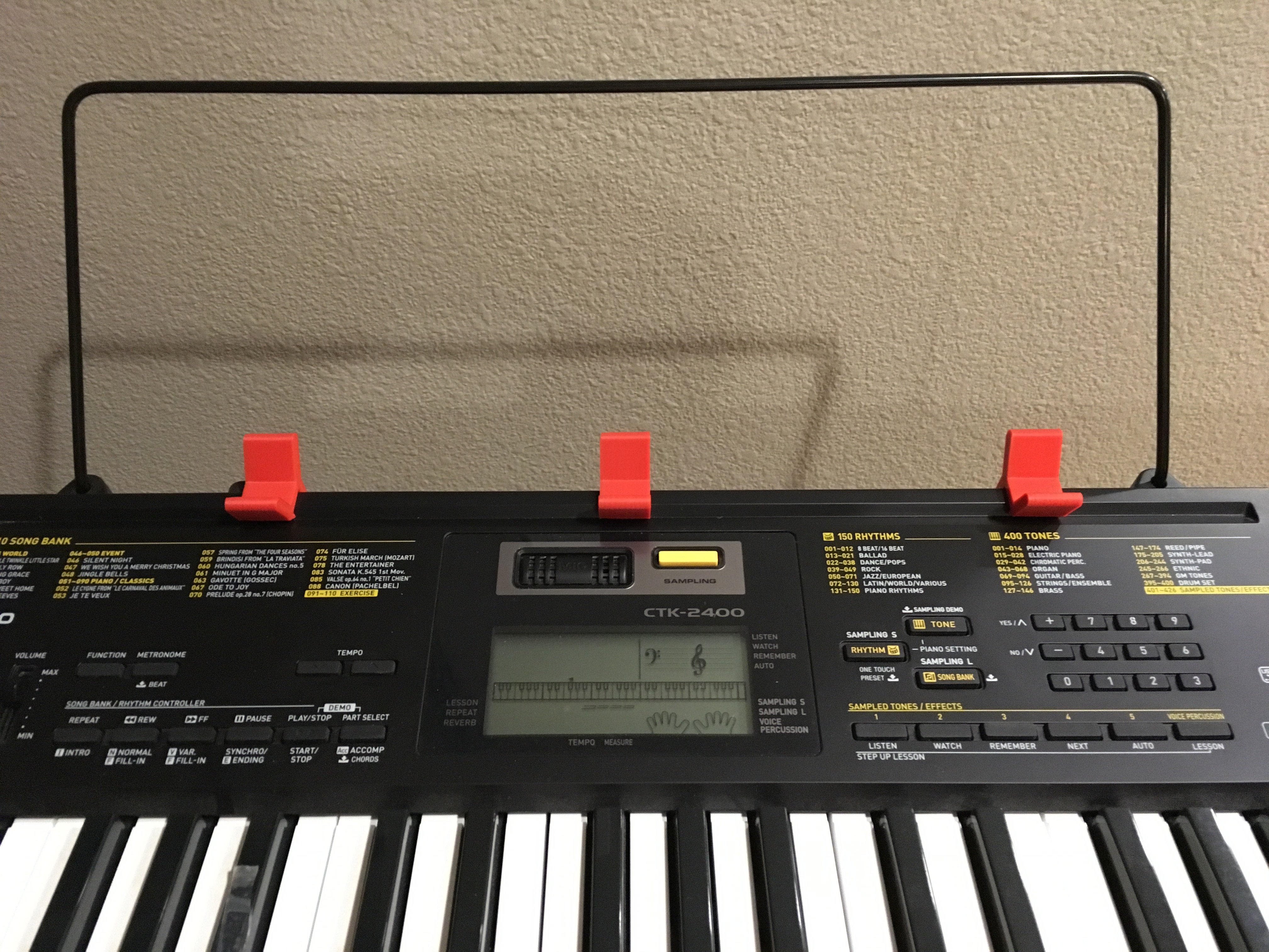 Music holder clip for several Casio CTK and LK keyboards.