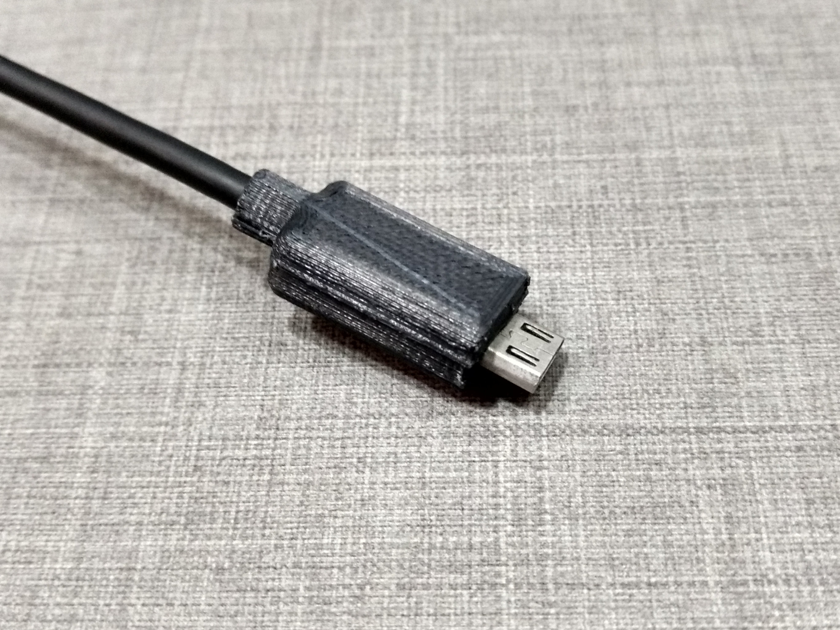 Micro USB plug enclosure