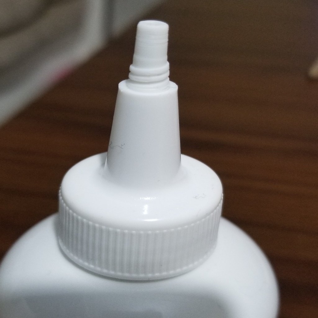 Squeeze bottle cap