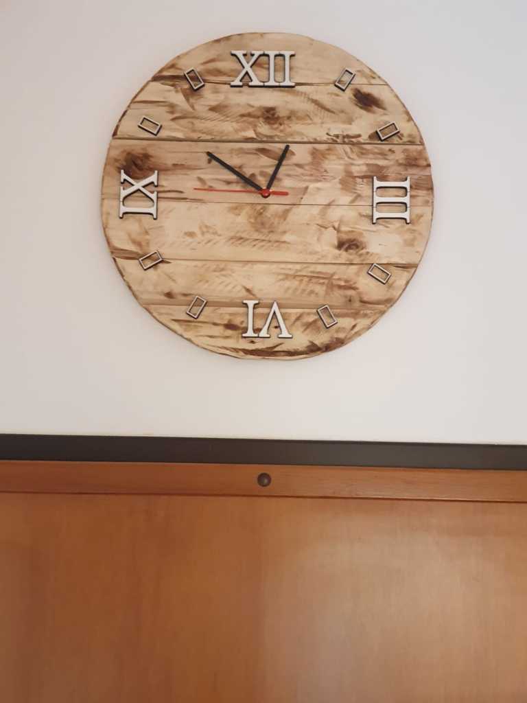 clock with multicolor Roman numerals