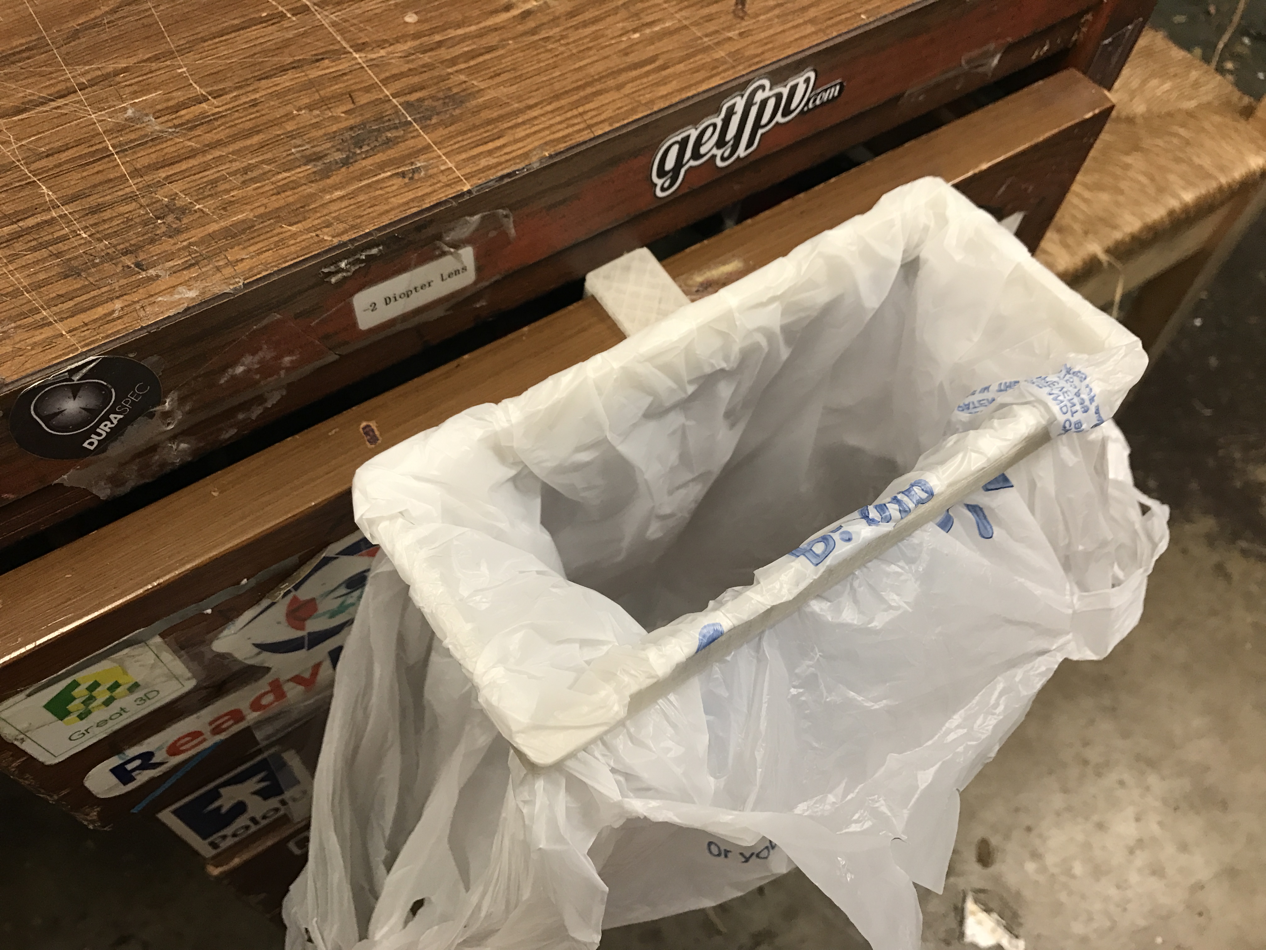 Plastic carrier bag trash or garbage bin/bag holder