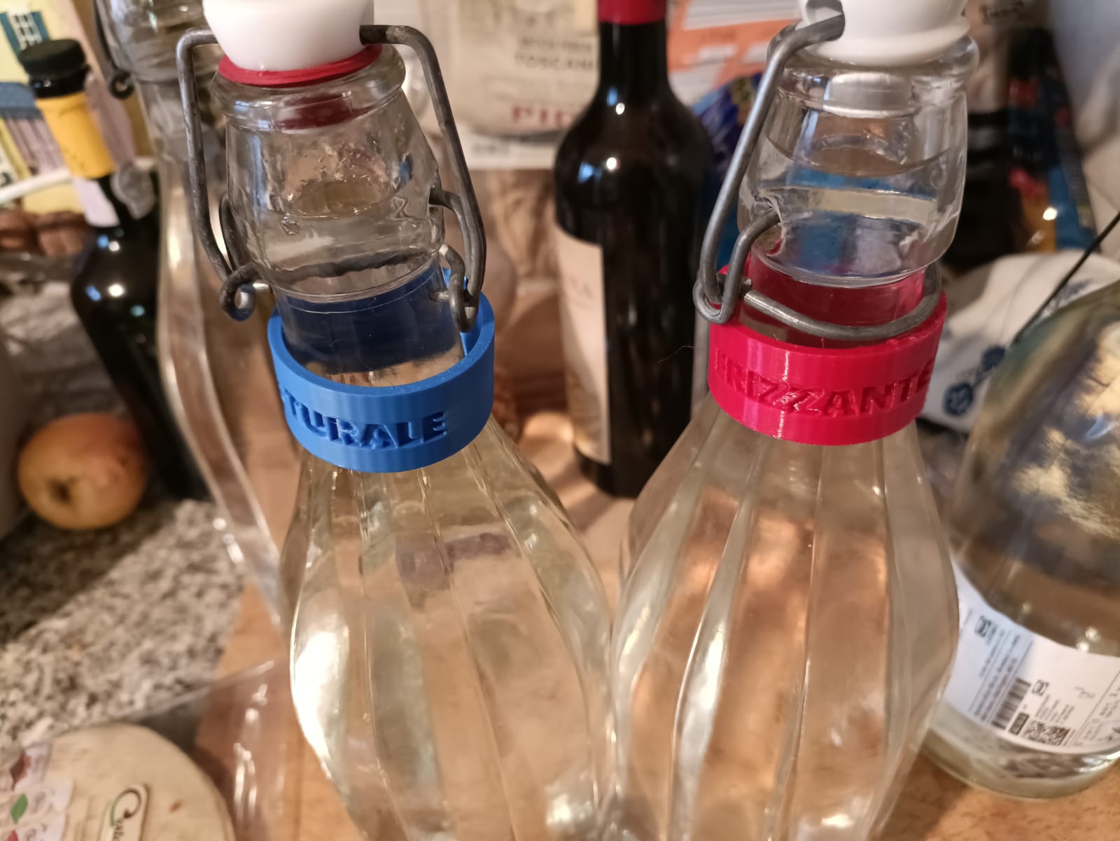 anelli bottiglie acqua naturale o frizzante