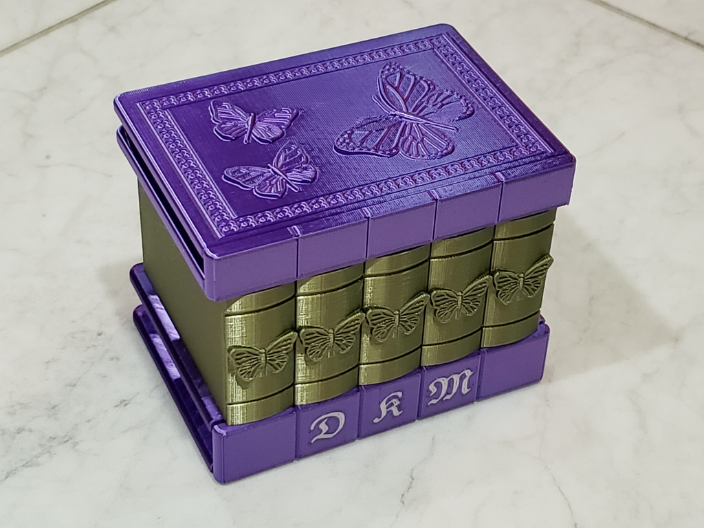 Multi-color monogrammed Secret Butterfly Box, OpenSCAD customizable