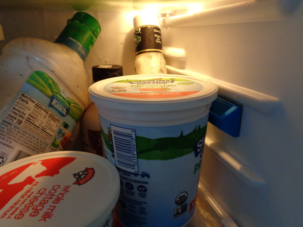 Refrigerator wall spacers to keep food from freezing