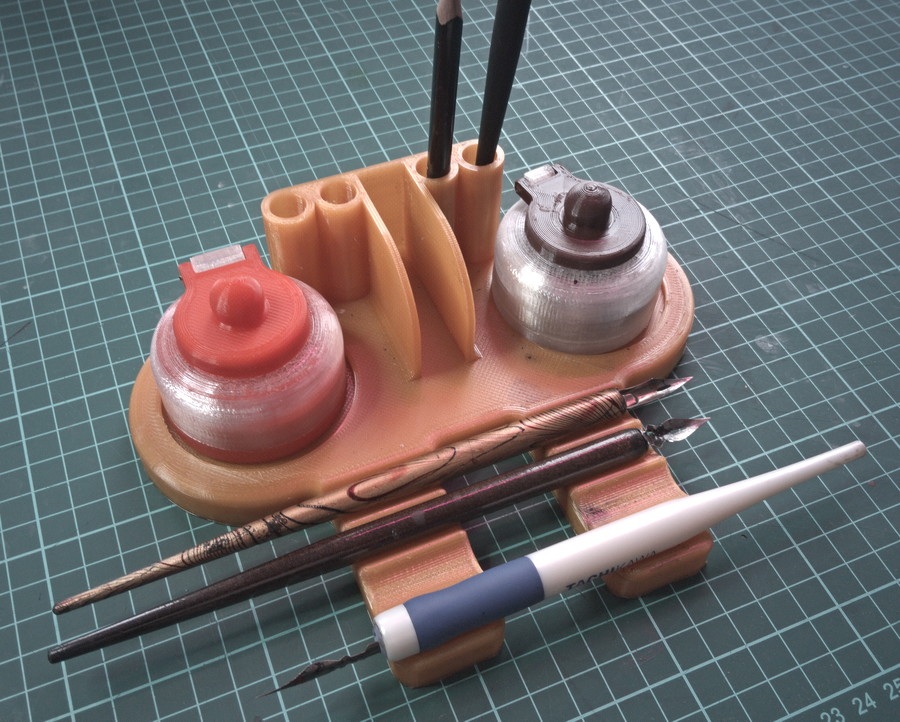 Inkwells and pens stand