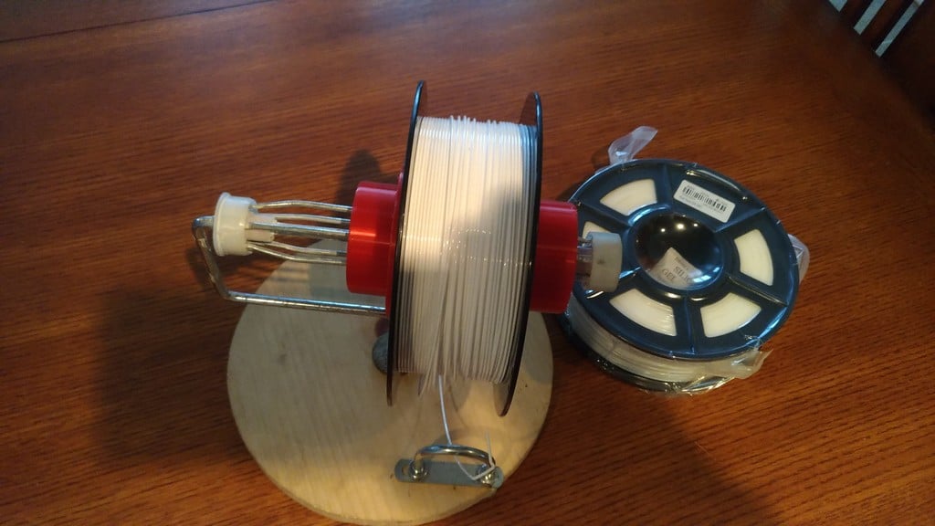 Paint roller filament dispenser