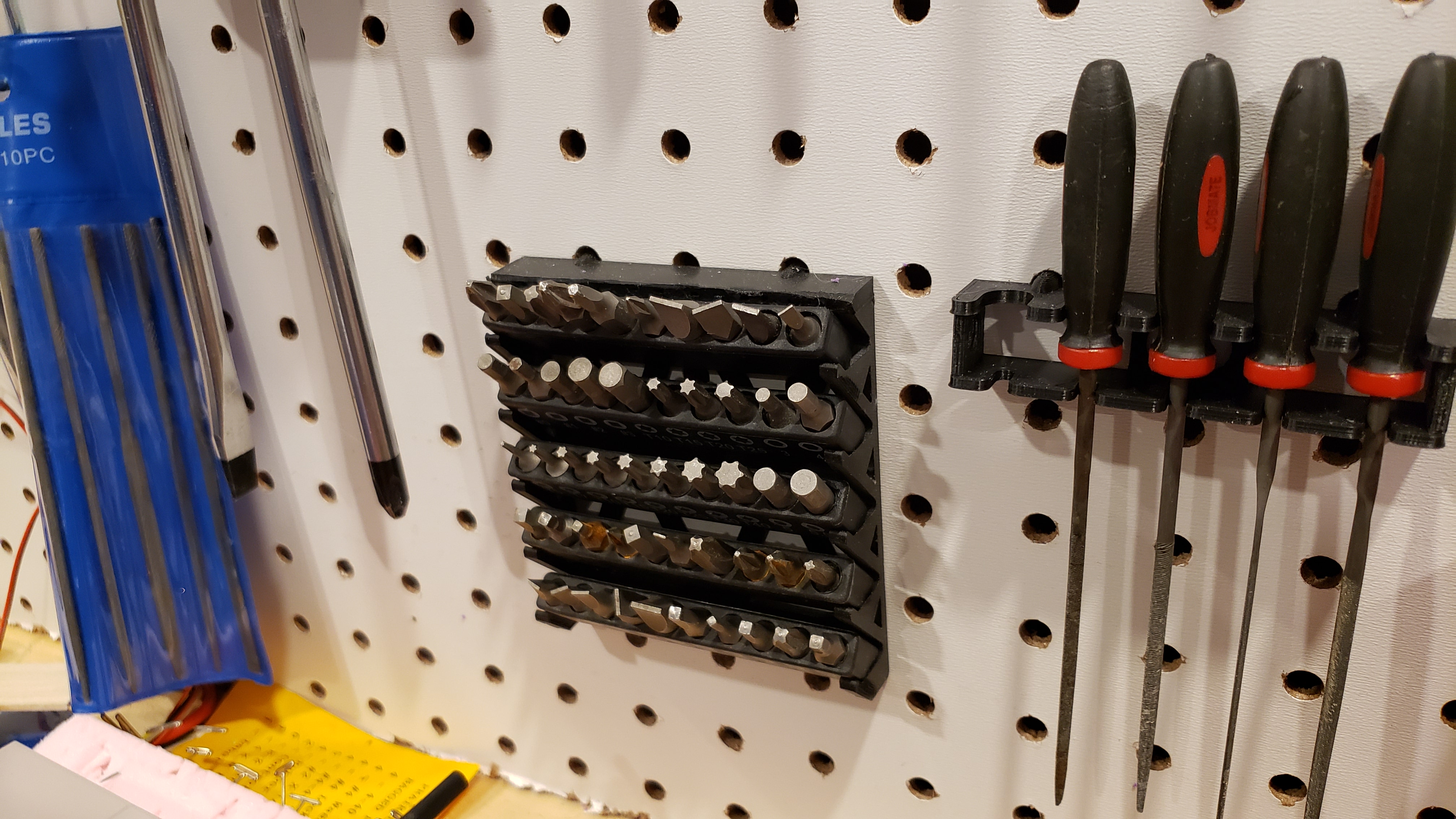 Peg board multi bit holder