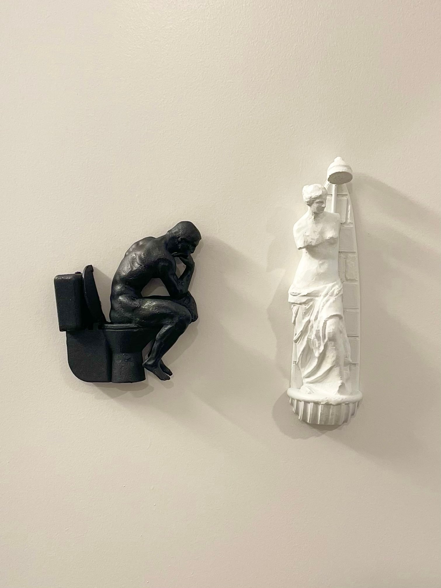 The Thinker toilet & Venus de Milo showering