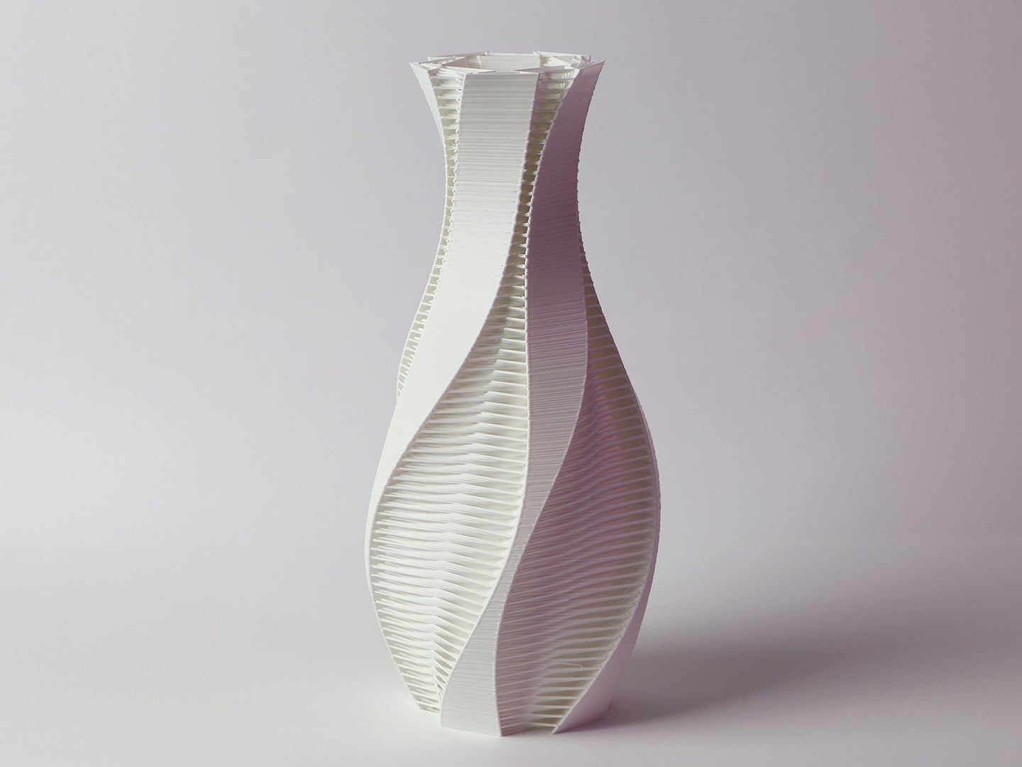 Twisted vase with strands