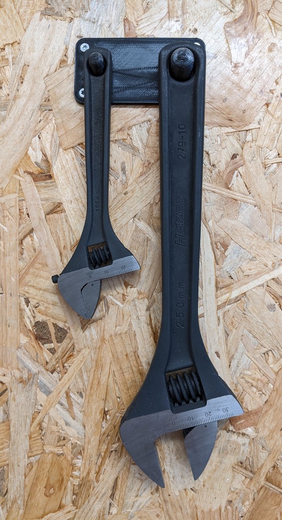 holder for flexible open end wrench