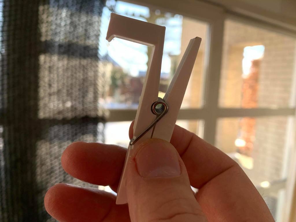 Clothespin with hook to hang up stuff quickly