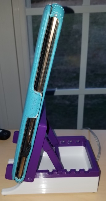 Much sturdier base and wider tablet hooks to accommodate wider cases.