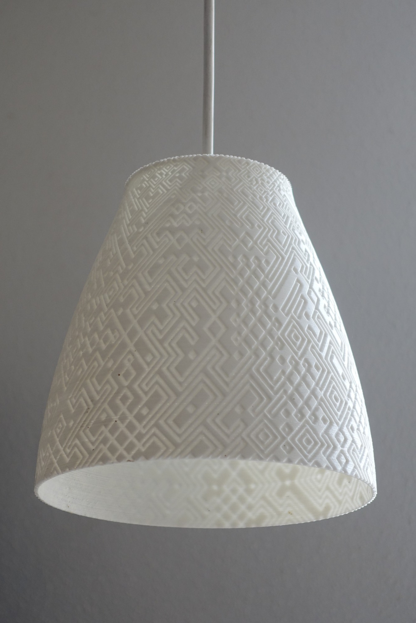 Lampshade with semi random geometric patterns