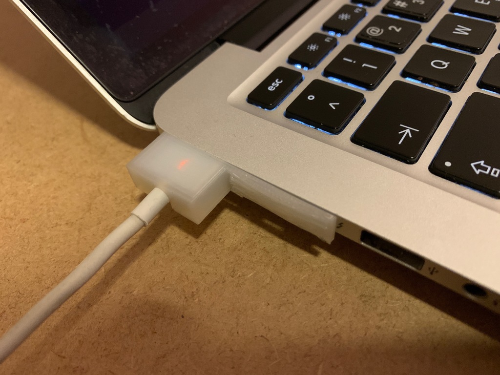 MacBook Pro power connection holder